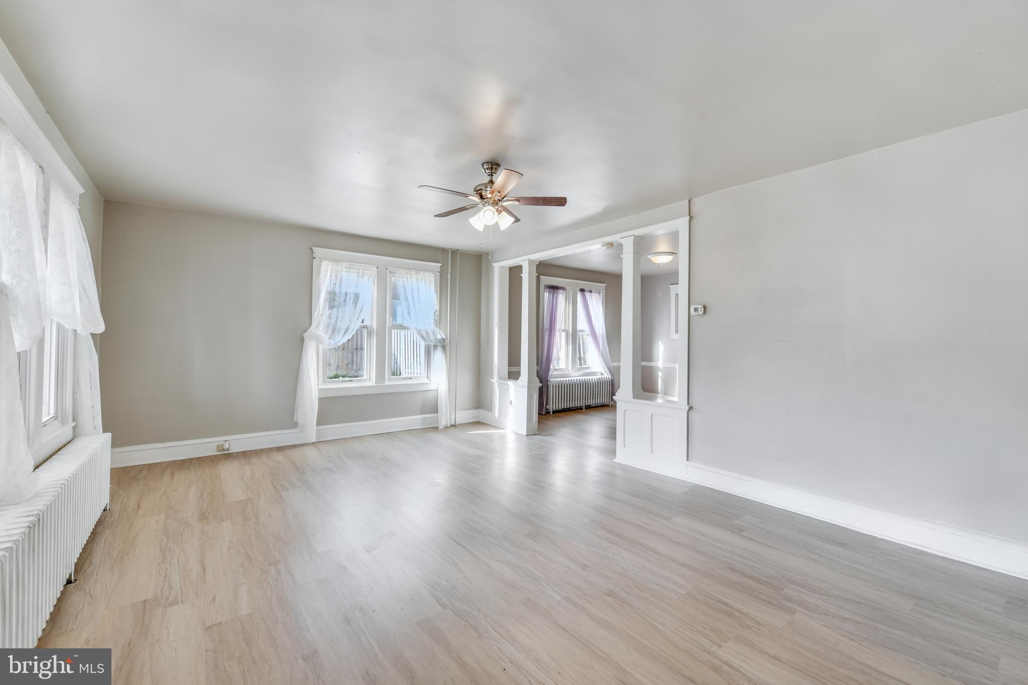 20 Pennwyn Terrace Reading, PA 19606 - Photo 4 of 16 a view of an empty room with a window and wooden floor