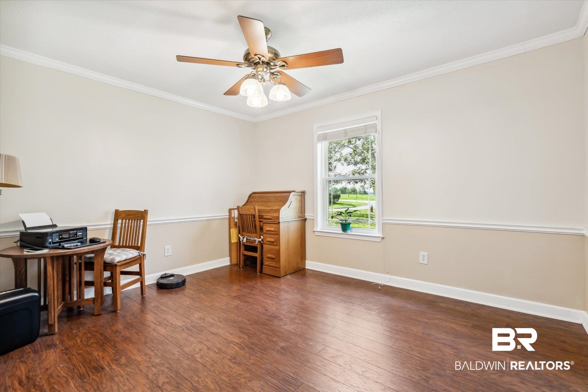 8710 Three Notch Road Mobile, AL 36619 - Photo 11 of 30 Office space with ceiling fan, dark wood-type flooring, and crown molding