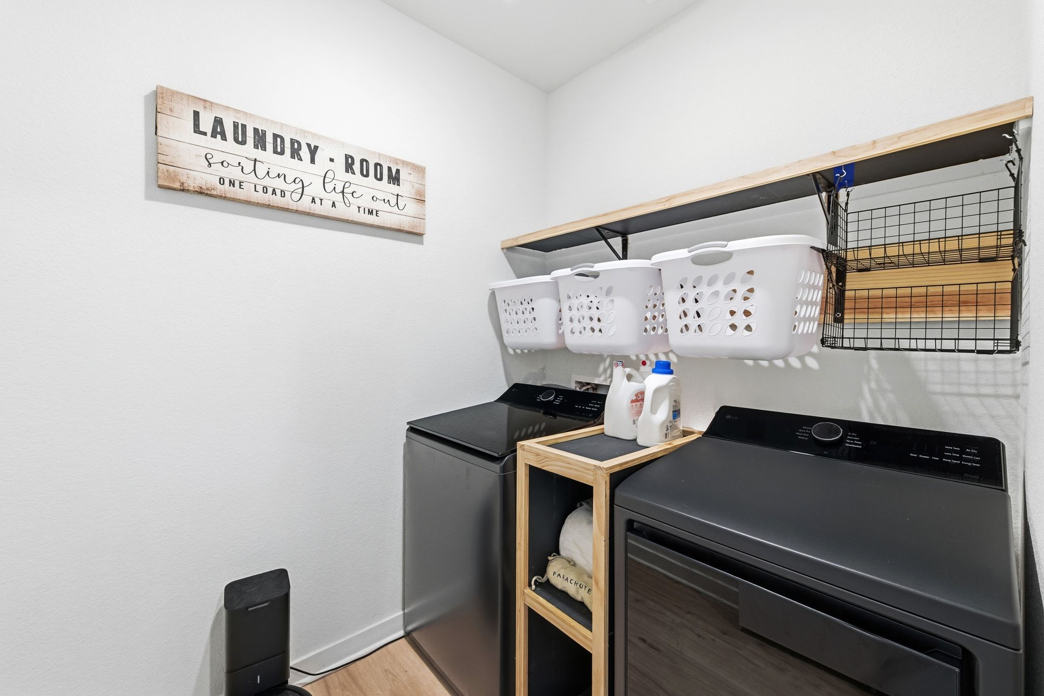 4420 Ingram Road Georgetown, TX 78628 - Photo 25 of 40 Laundry room featuring light wood finished floors and washer and clothes dryer