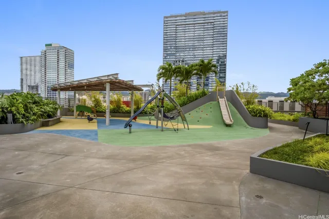 a house with a yard and potted plants