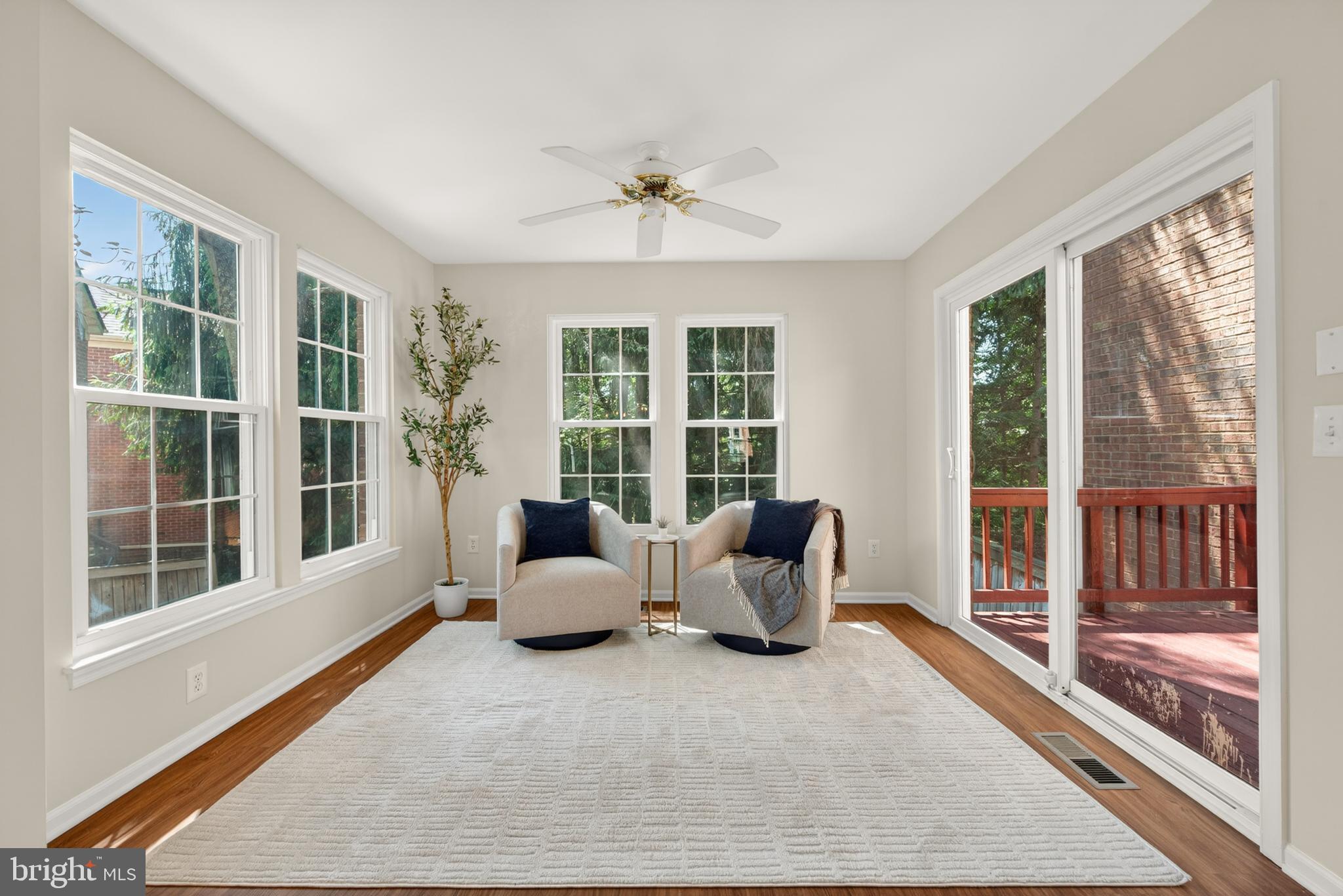 1409 Park Garden Lane Reston, VA 20194 - Photo 14 of 41 a living room with furniture and windows