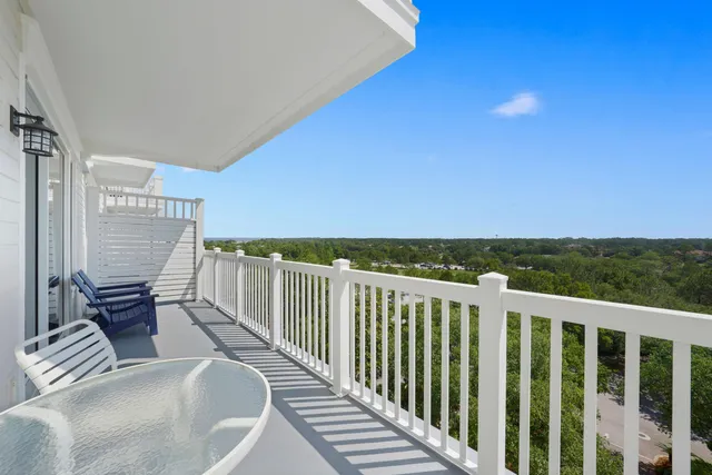 a view of balcony with furniture