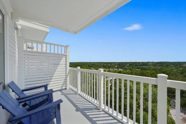 a balcony with wooden floor