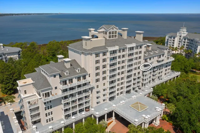 aerial view of a building with an ocean view
