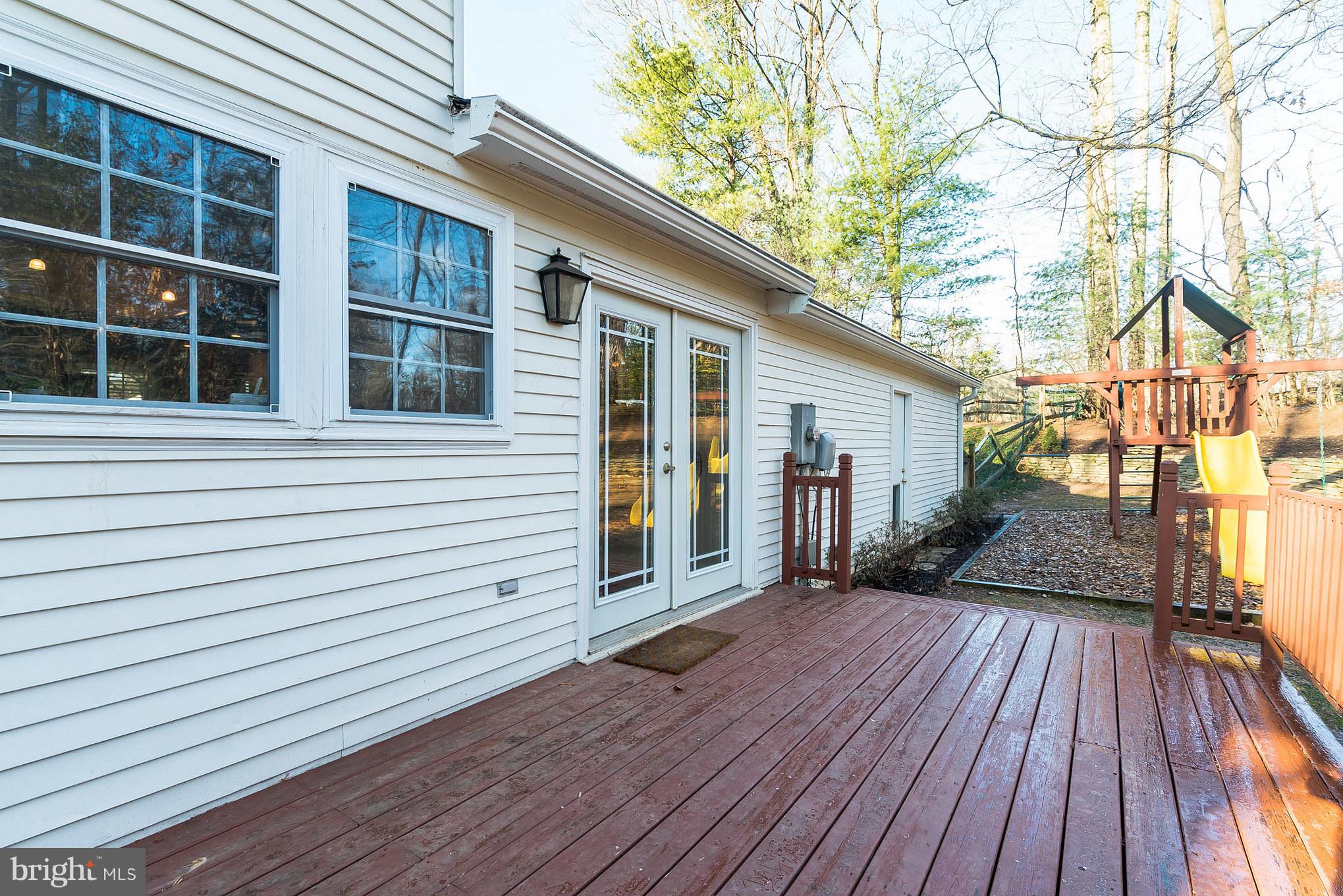 11710 Ayreshire Road Oakton, VA 22124 - Photo 26 of 30 Large deck off kitchen