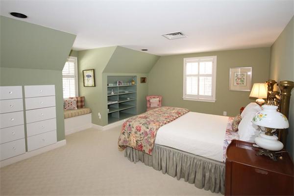 47 Walnut Road Weston, MA 02493 - Photo 19 of 25 a bedroom with a bed and wooden floor