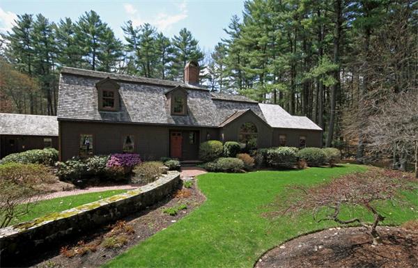 47 Walnut Road Weston, MA 02493 - Photo 22 of 25 a front view of house with yard and outdoor seating