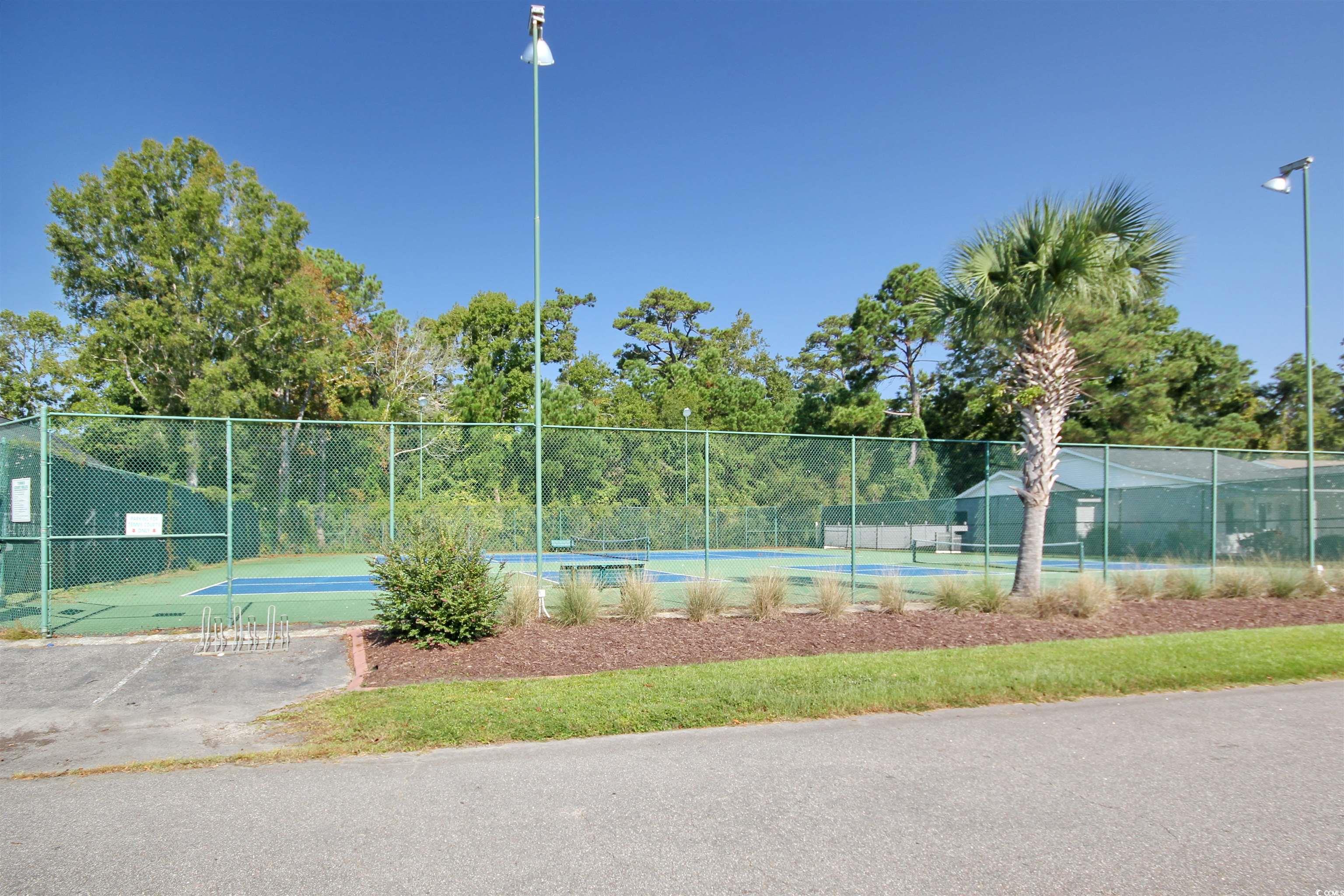 462 Bay Drive Murrells Inlet, SC 29576 - Photo 33 of 37 Community pool with a patio area