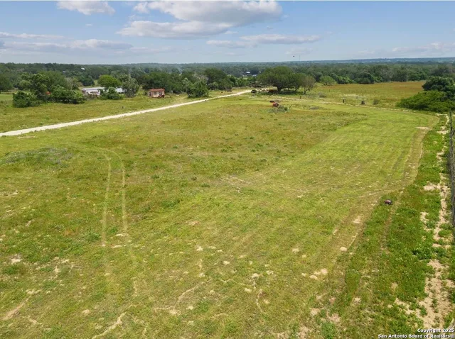a view of a city with lawn chairs