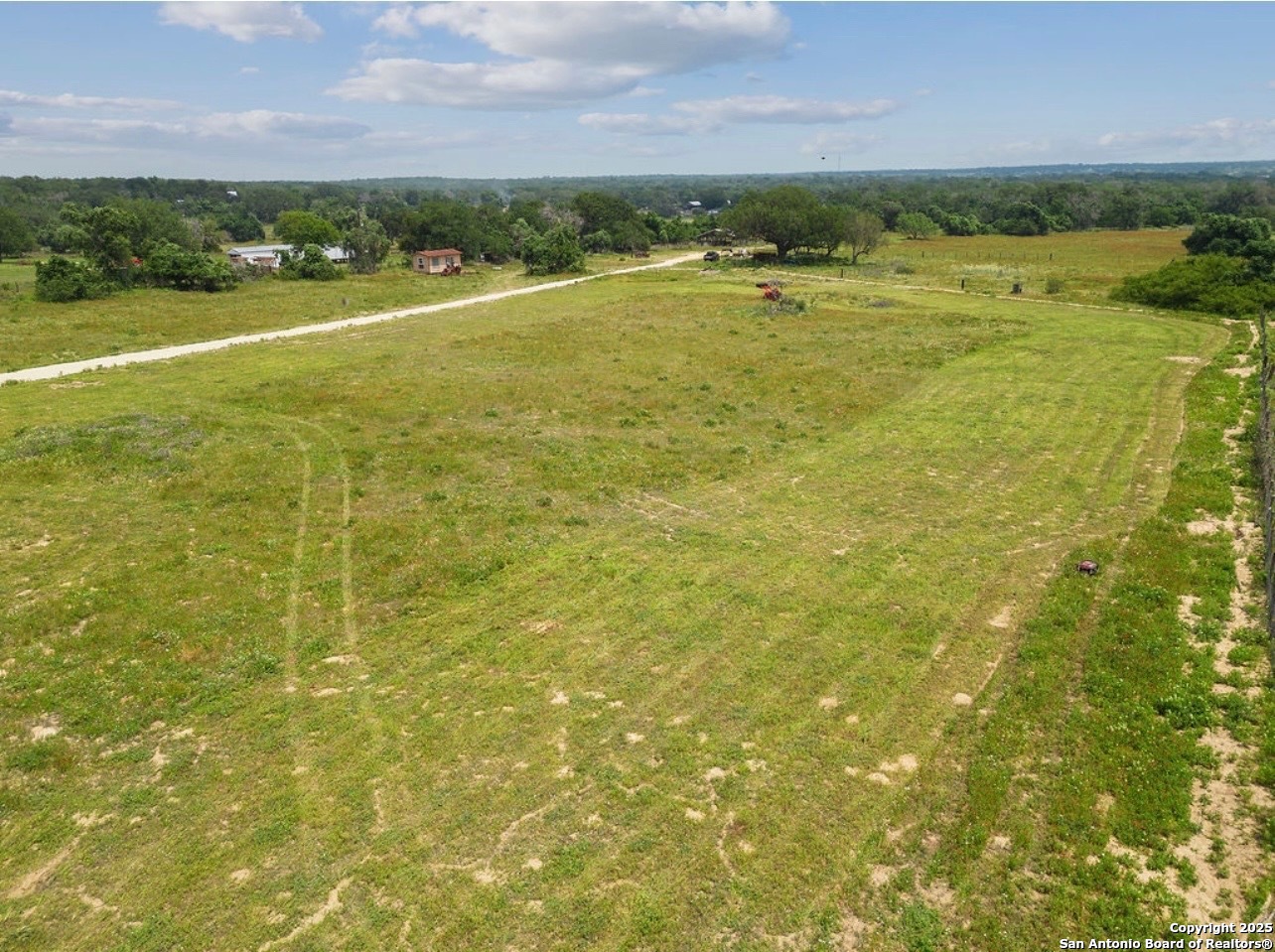 a view of a city with lawn chairs