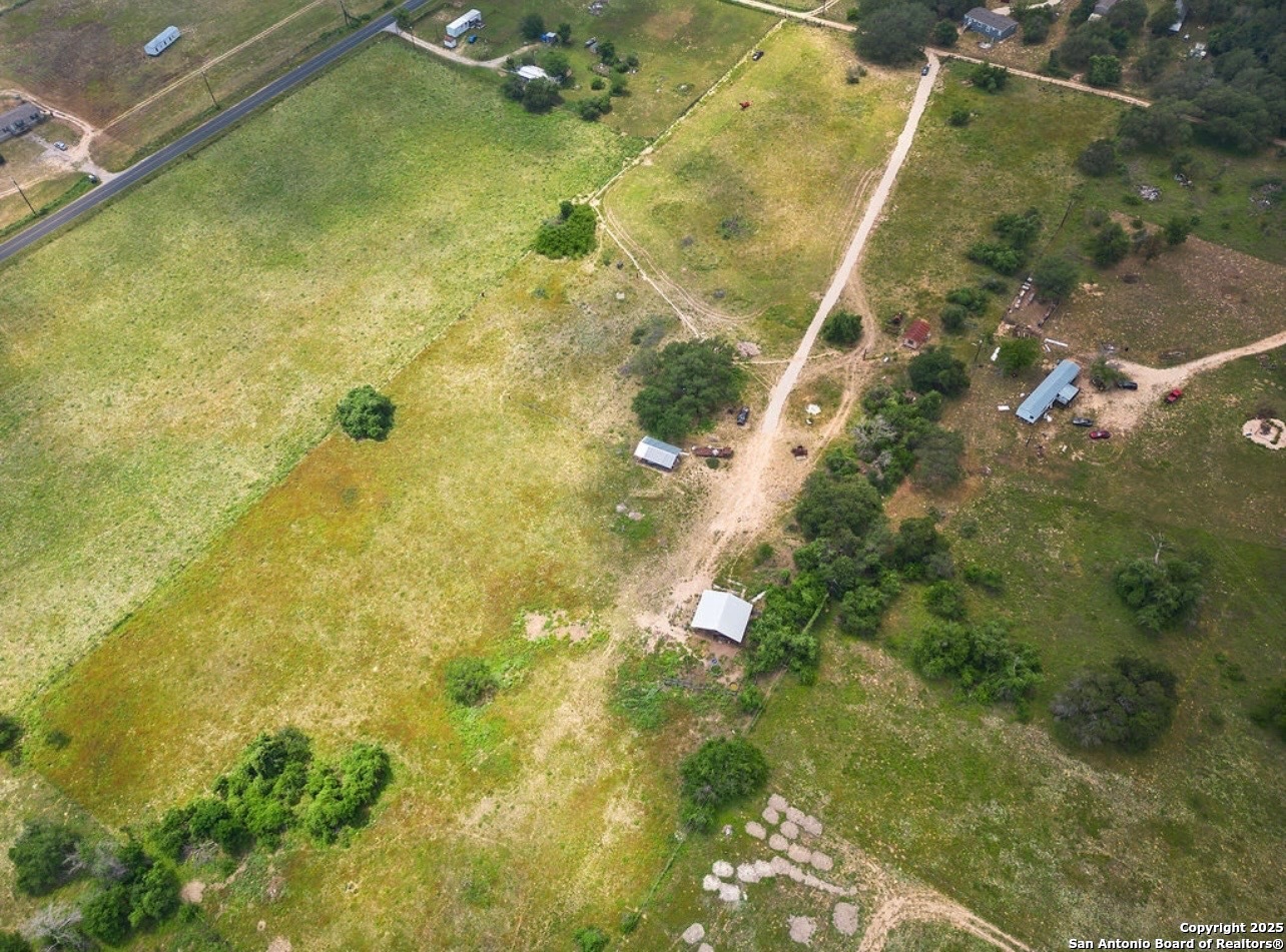 1585 Mogford Road San Antonio, TX 78264 - Photo 7 of 9 a view of a yard