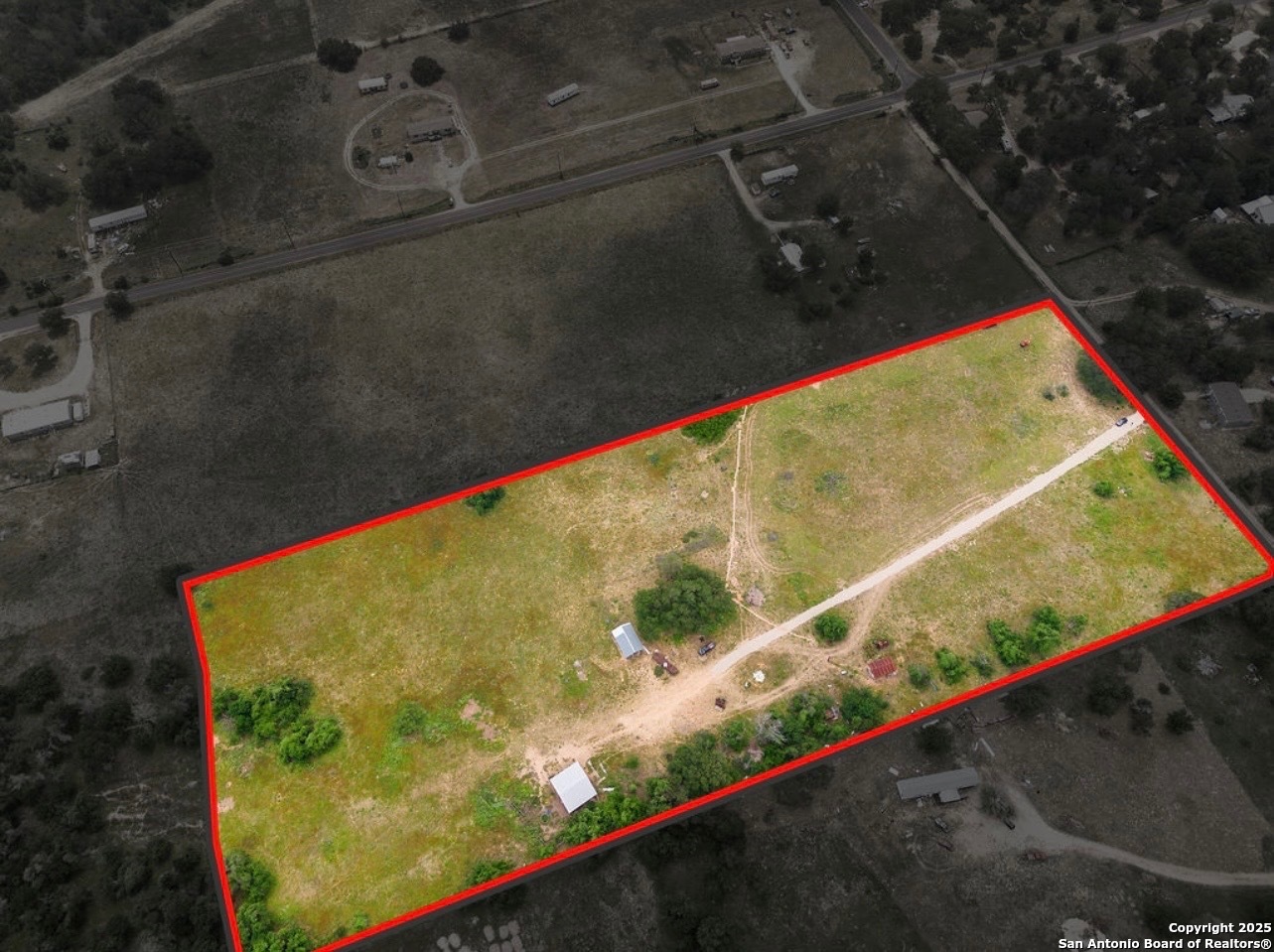 1585 Mogford Road San Antonio, TX 78264 - Photo 8 of 9 a view of a back yard