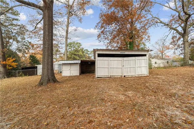 a house with trees in front of it
