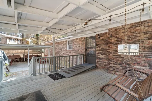 a view of a balcony with car parked