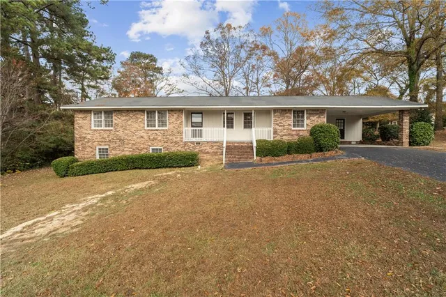 front view of a house with a patio