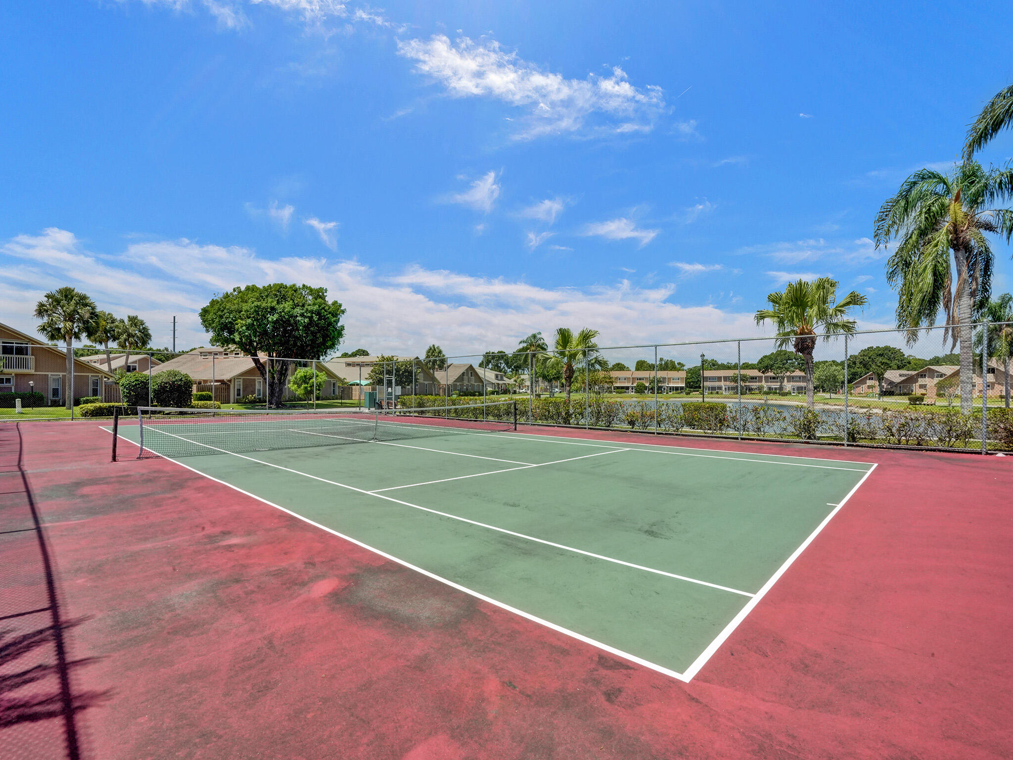 313 Maplecrest Circle Jupiter, FL 33458 - Photo 26 of 30 Tennis Court