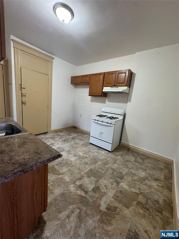 43 66th Street West New York, NJ 07093 - Photo 3 of 8 an empty room with storage