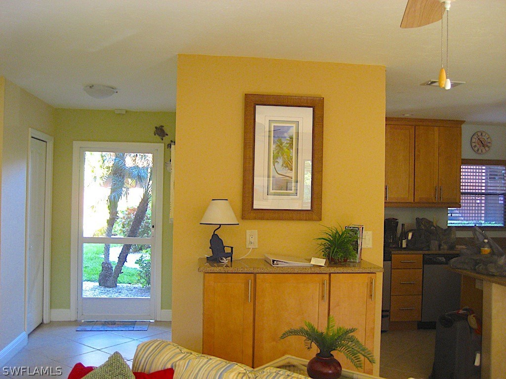 5117 Sea Bell Road, Unit F108 Sanibel, FL 33957 - Photo 3 of 17 a living room with furniture and a window
