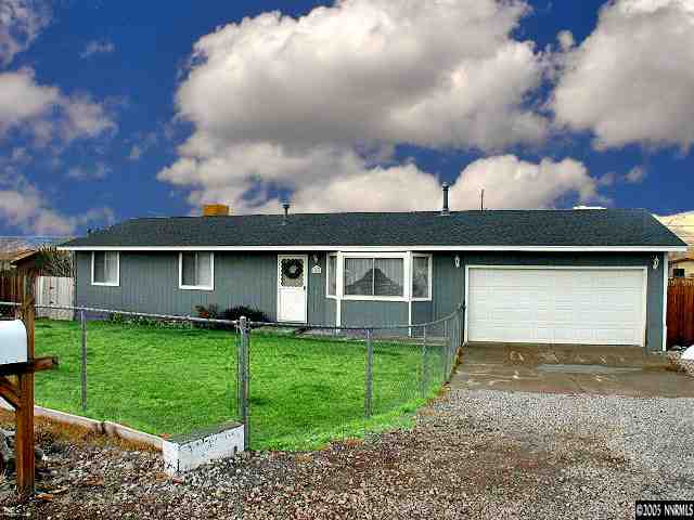 3860 Fulmar Court Reno, NV 89508 - Photo 1 of 9 a front view of a house with a yard and garage