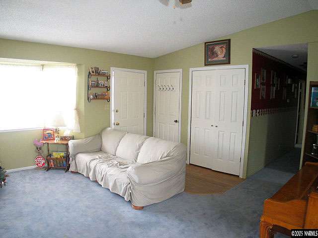 3860 Fulmar Court Reno, NV 89508 - Photo 2 of 9 a living room with furniture and a window