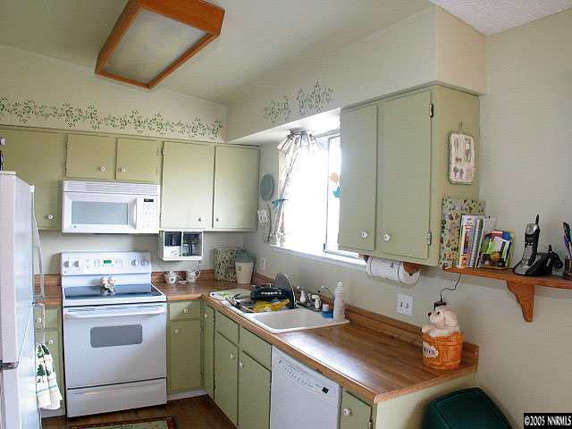 3860 Fulmar Court Reno, NV 89508 - Photo 3 of 9 a room with a sink cabinets and window