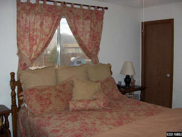 3860 Fulmar Court Reno, NV 89508 - Photo 5 of 9 a bed room with a bed and a window