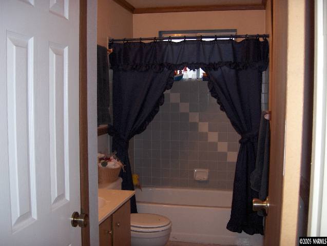 3860 Fulmar Court Reno, NV 89508 - Photo 6 of 9 a view of balcony with wooden floor and tub