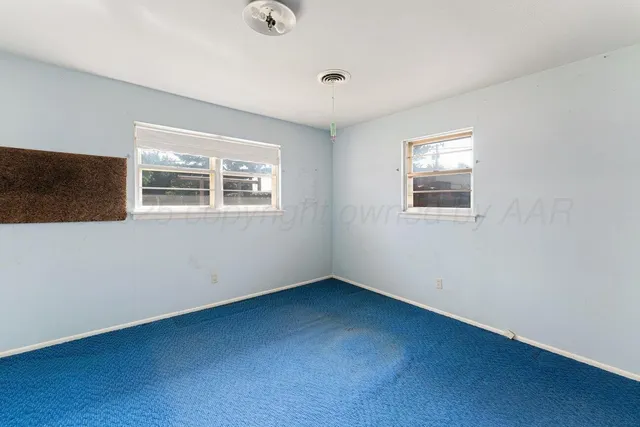 an empty room with a window