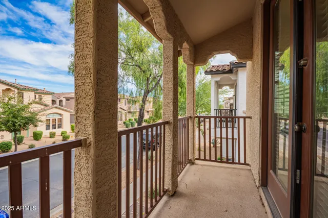 a view of a porch with a floor to ceiling window
