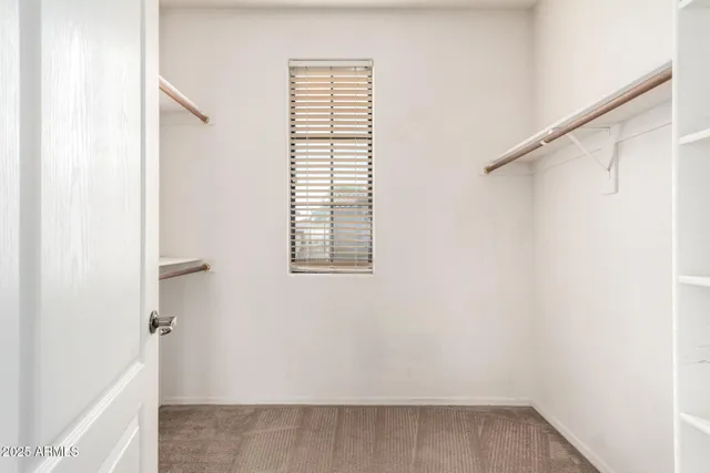 a view of a room that has a window in it