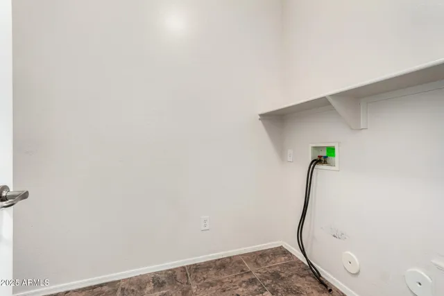 a view of a house with a snow in the yard