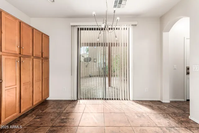 a view of a city from a hallway