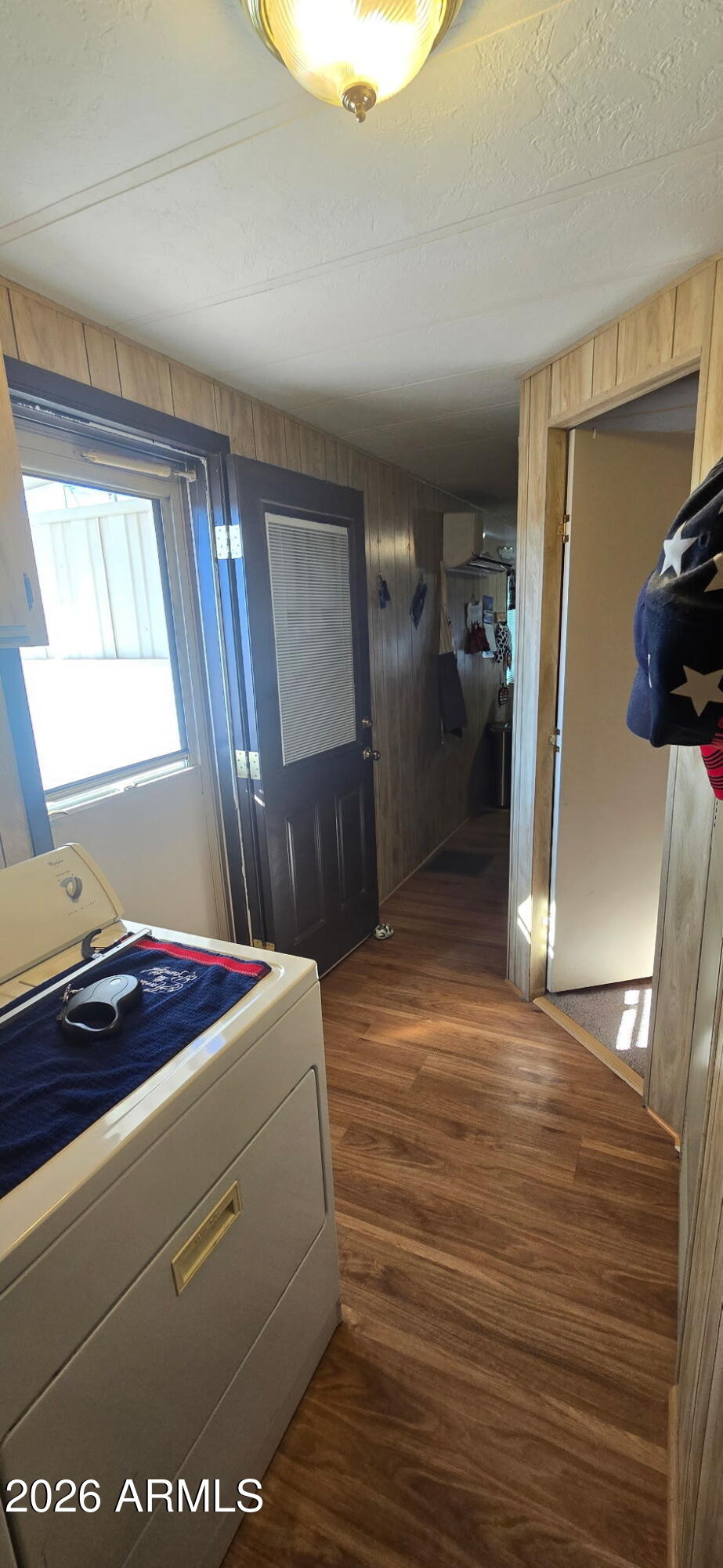 800 West Apache Trail, Unit 18 Apache Junction, AZ 85120 - Photo 12 of 20 a room with a bed and a mirror