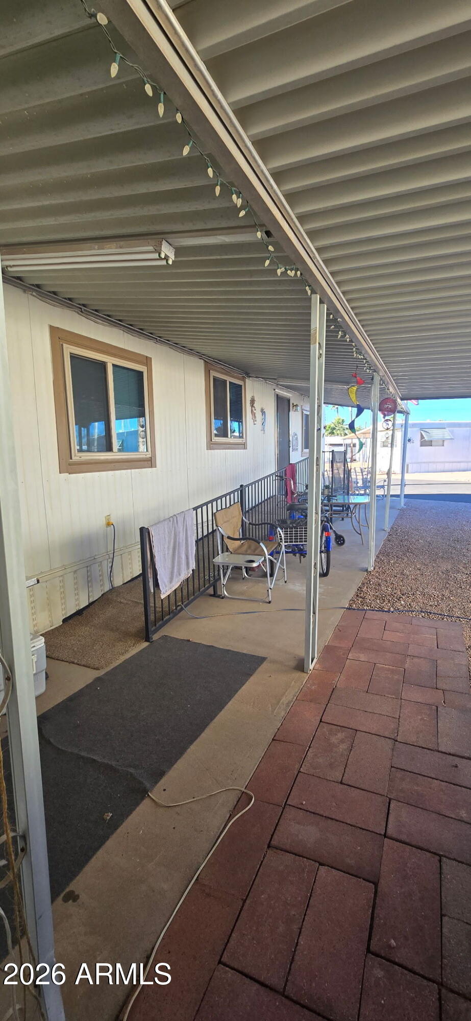 800 West Apache Trail, Unit 18 Apache Junction, AZ 85120 - Photo 6 of 20 a living room with a couch