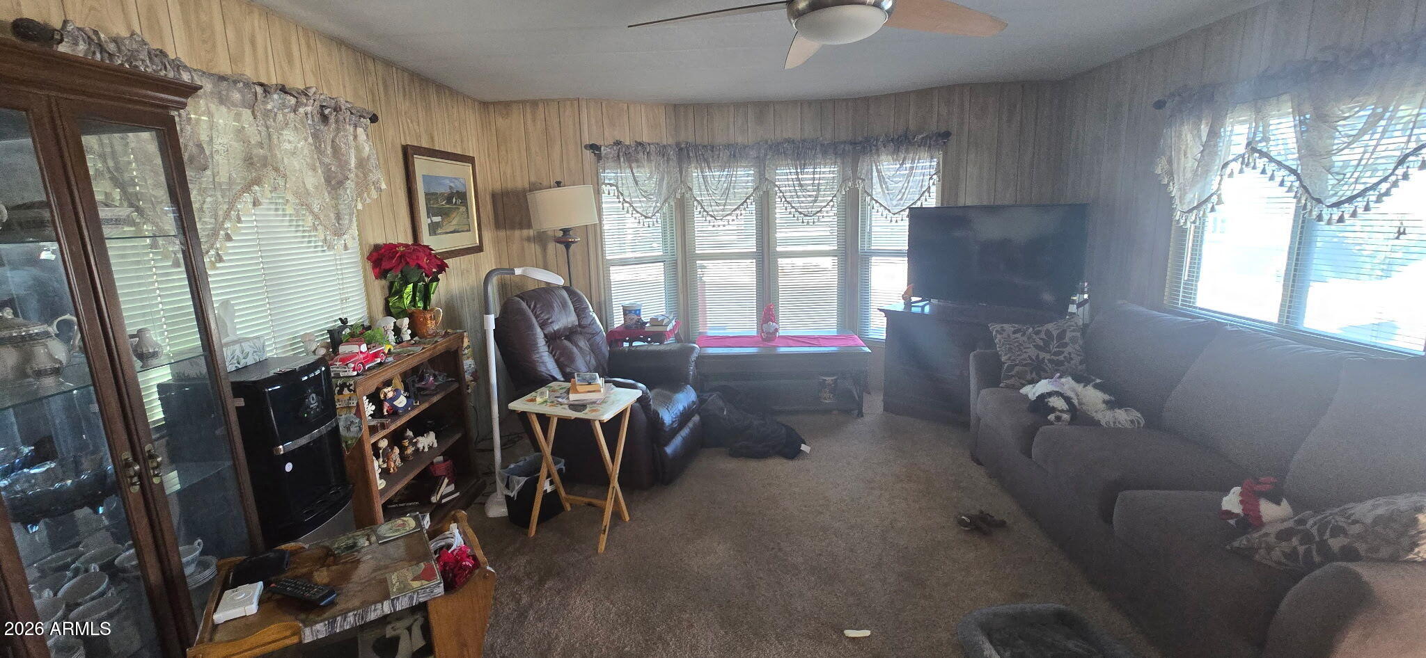 800 West Apache Trail, Unit 18 Apache Junction, AZ 85120 - Photo 8 of 20 a living room with furniture and a window