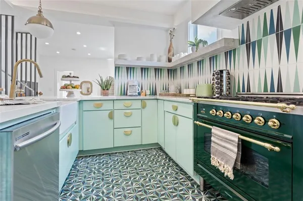 a kitchen with a sink and cabinets