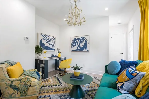 a living room with furniture and a window