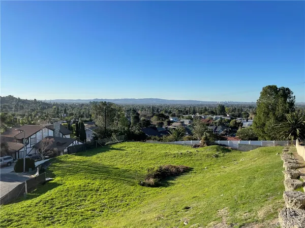 a view of a golf course with a yard