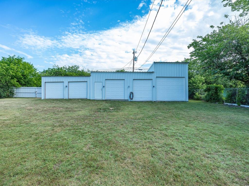 907 4th Street Graham, TX 76450 - Photo 30 of 34 a view of a backyard