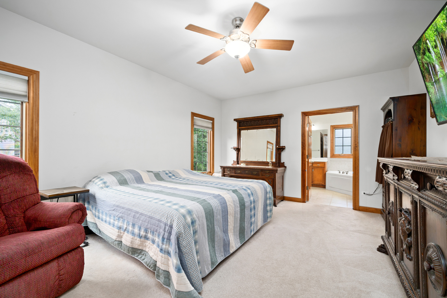 749 Merrill New Road Sugar Grove, IL 60554 - Photo 17 of 43 a bedroom with a bed flat screen tv and a window