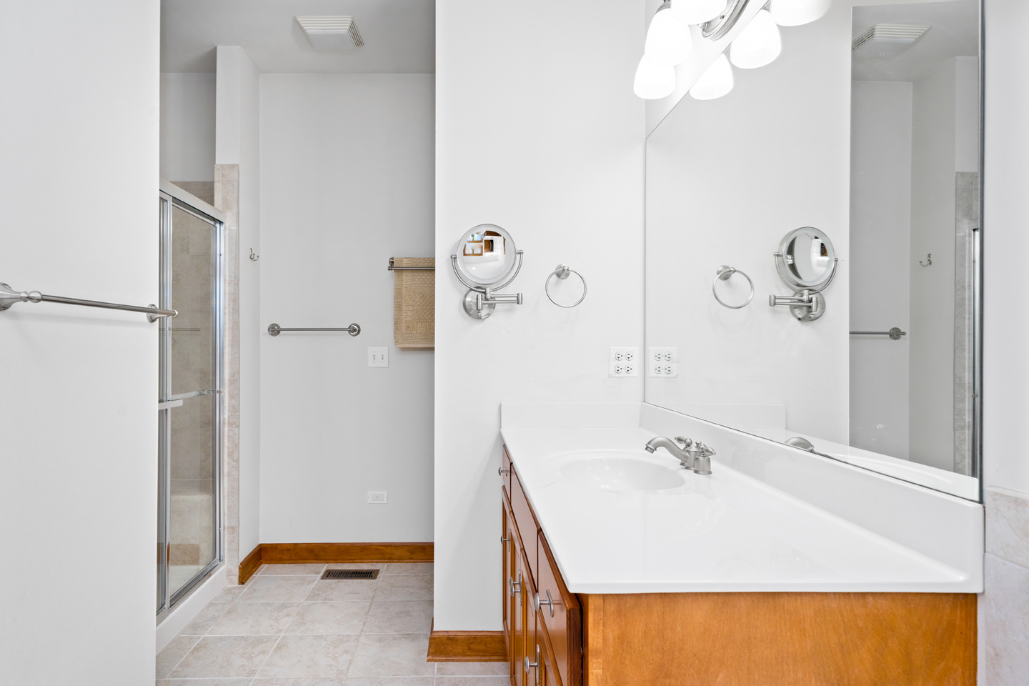 749 Merrill New Road Sugar Grove, IL 60554 - Photo 19 of 43 a bathroom with a sink a mirror and shower