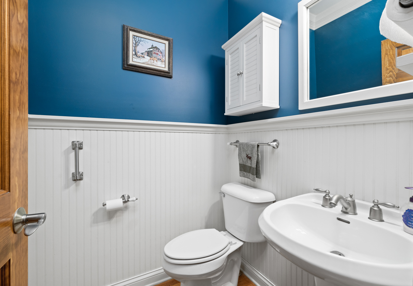 749 Merrill New Road Sugar Grove, IL 60554 - Photo 21 of 43 a bathroom with a sink mirror and toilet