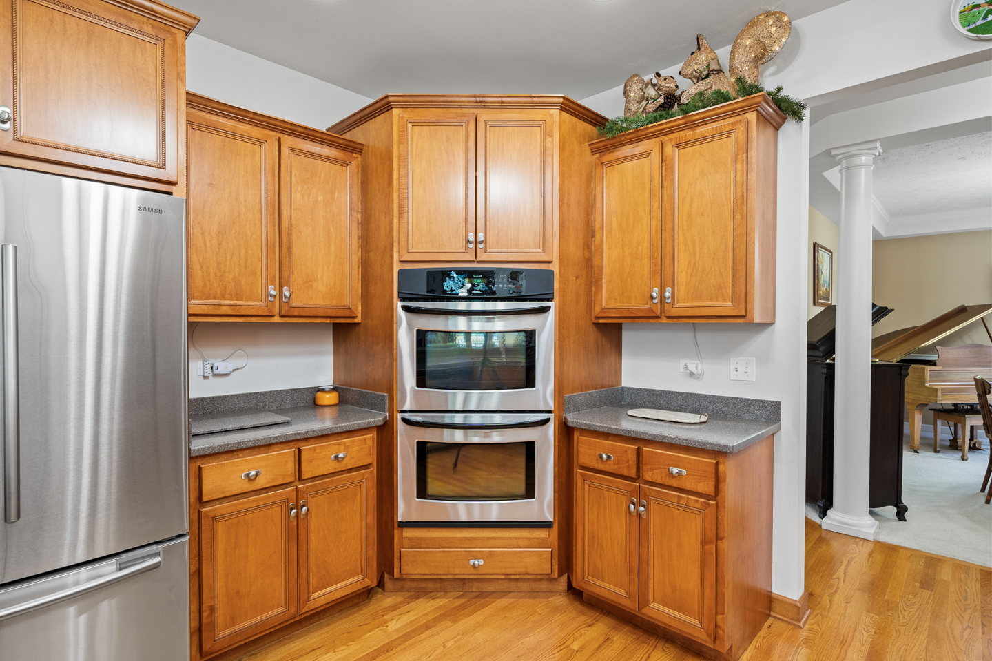 749 Merrill New Road Sugar Grove, IL 60554 - Photo 10 of 43 a kitchen with stainless steel appliances granite countertop a refrigerator a stove and a sink
