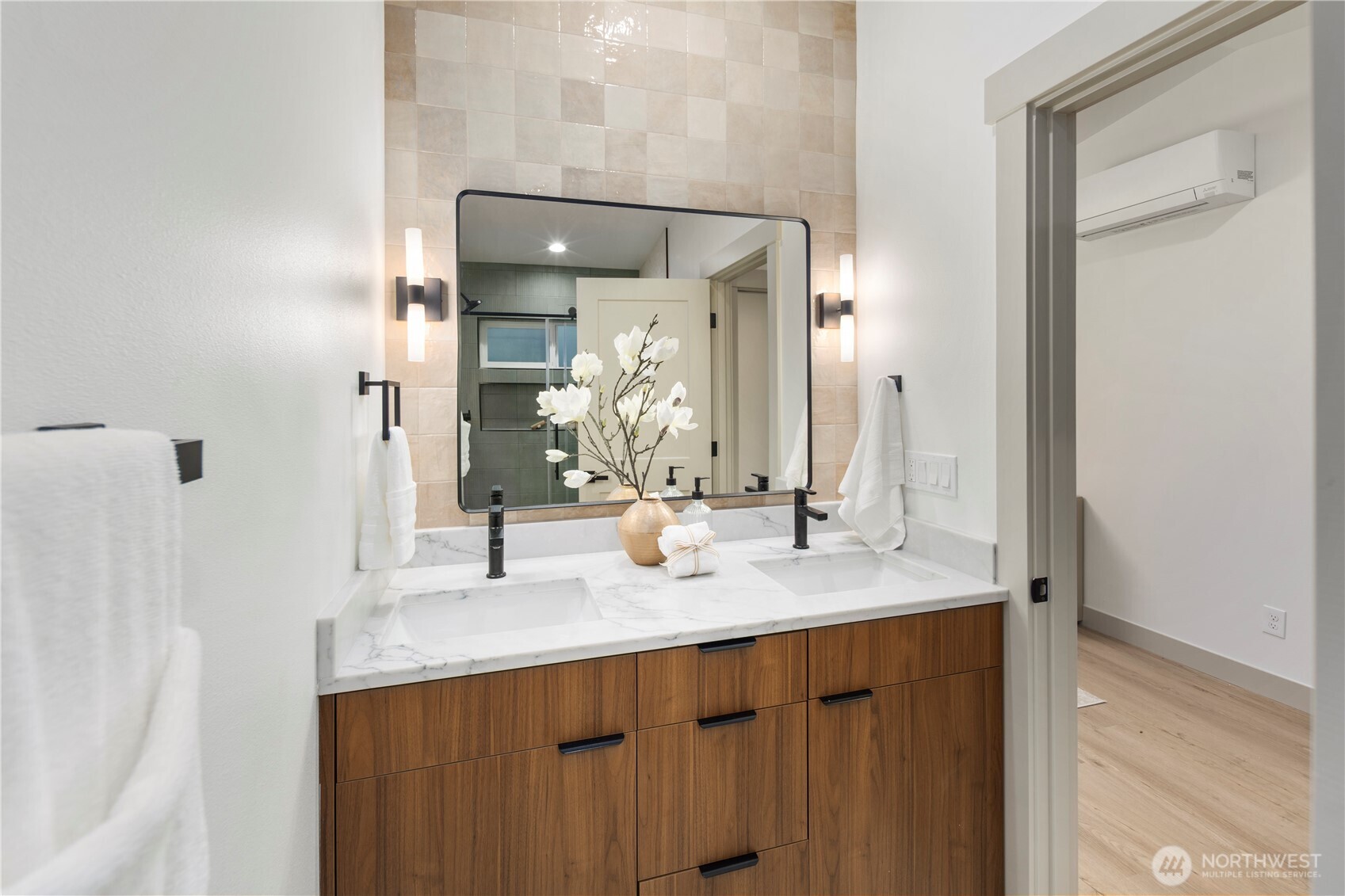 815 26th Avenue South, Unit B Seattle, WA 98144 - Photo 14 of 33 a bathroom with a double vanity sink and a mirror