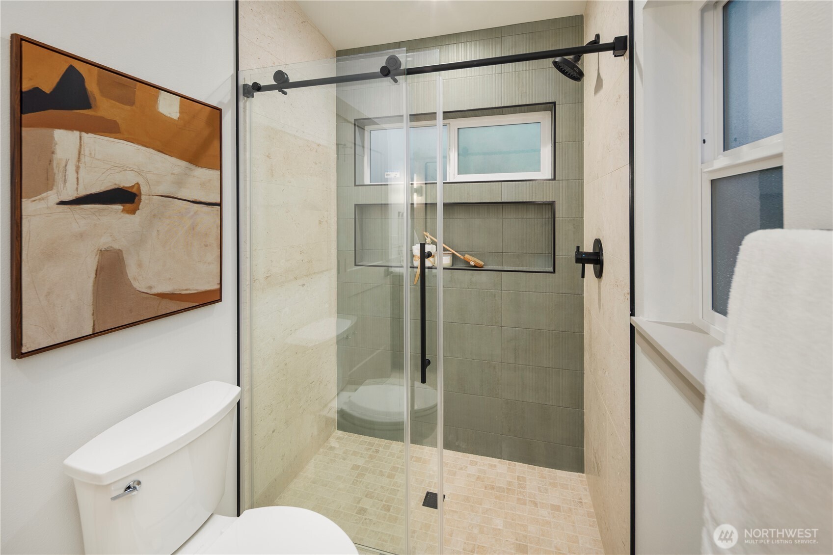 815 26th Avenue South, Unit B Seattle, WA 98144 - Photo 15 of 33 a bathroom with a shower and toilet