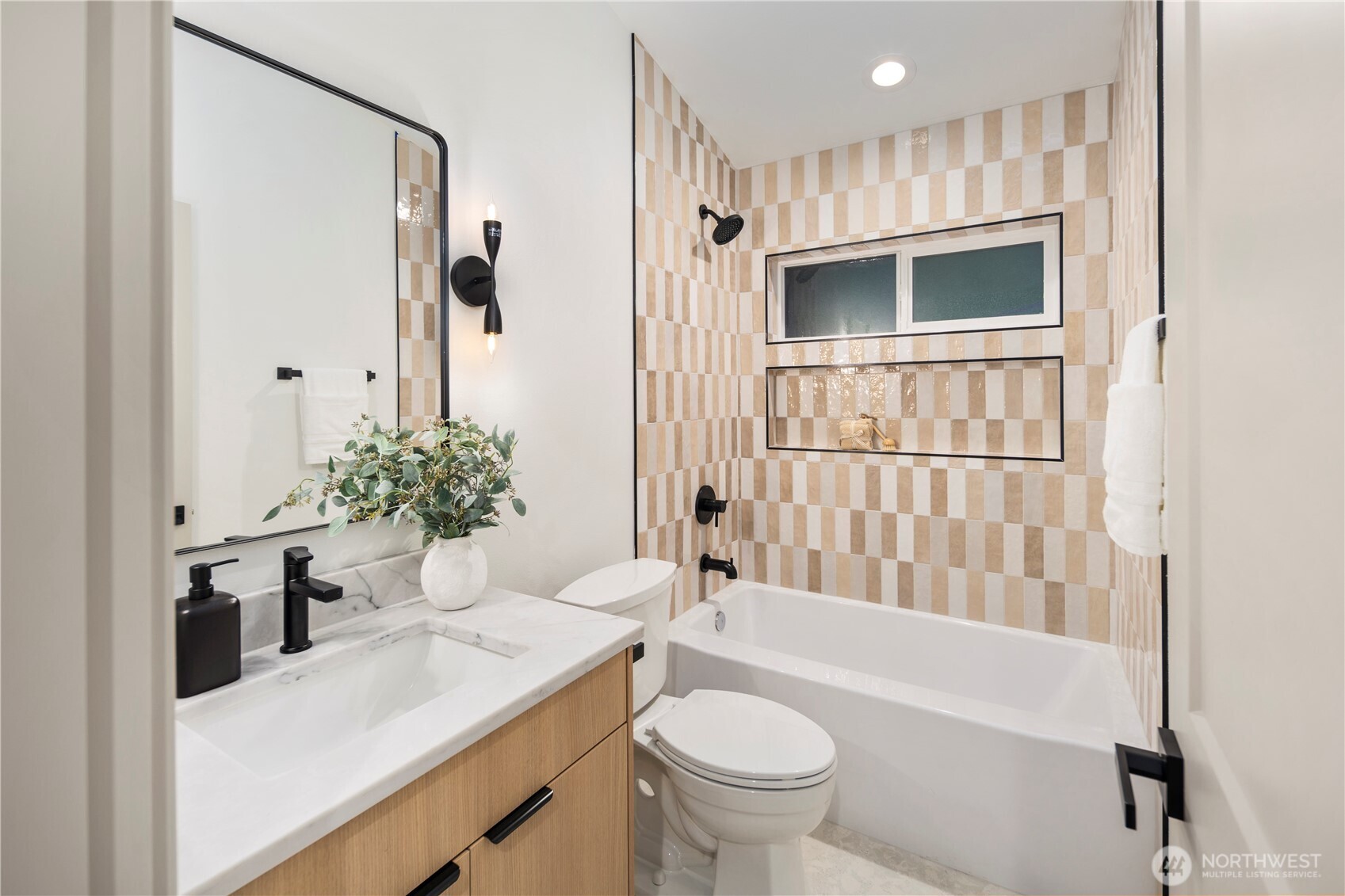 815 26th Avenue South, Unit B Seattle, WA 98144 - Photo 18 of 33 a bathroom with a sink a toilet and shower