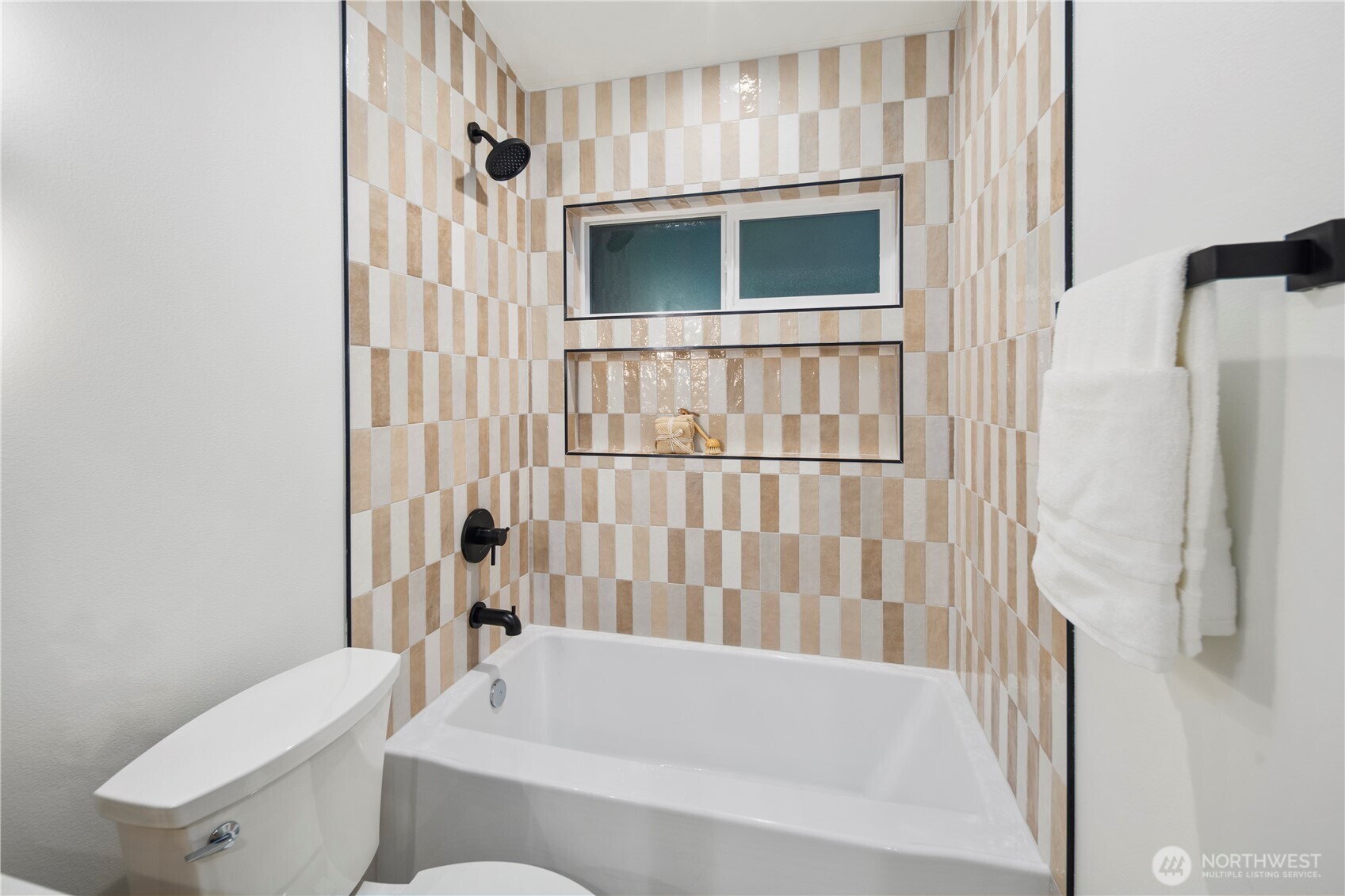 815 26th Avenue South, Unit B Seattle, WA 98144 - Photo 19 of 33 a bathroom with a toilet bathtub and shower