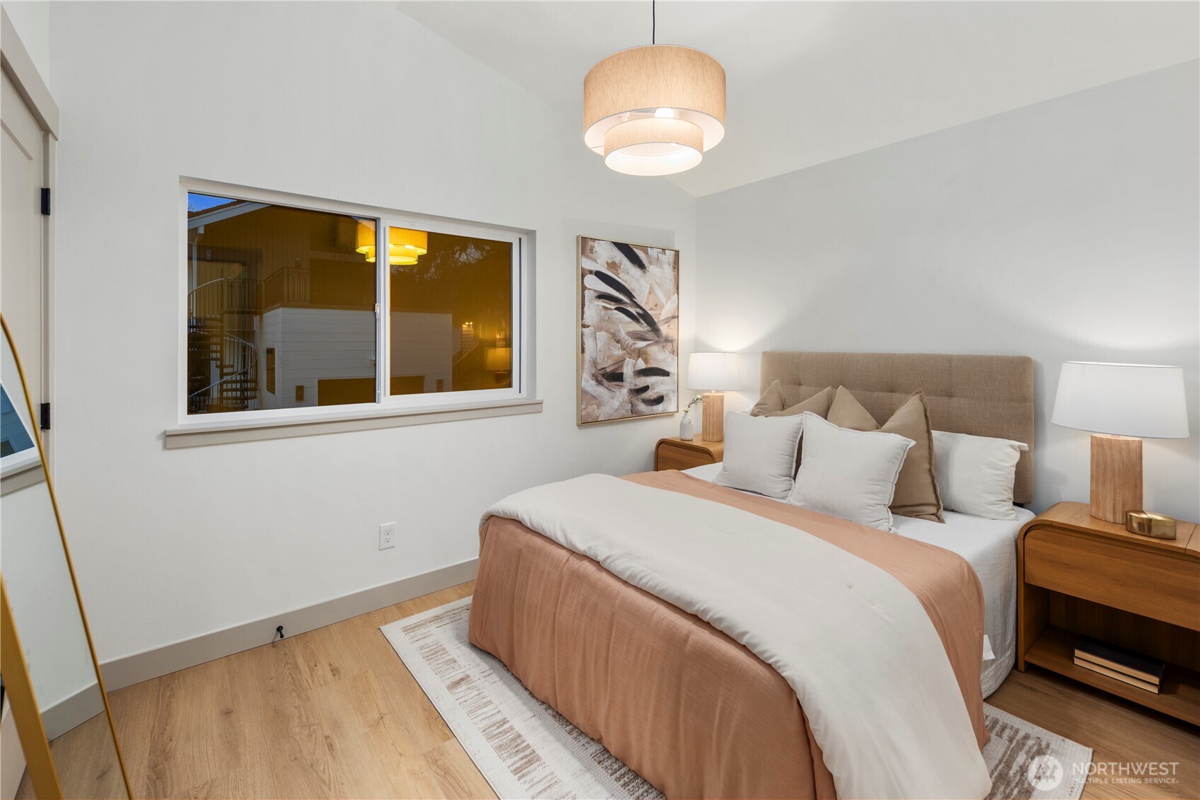 815 26th Avenue South, Unit B Seattle, WA 98144 - Photo 20 of 33 a bedroom with a large bed and a window