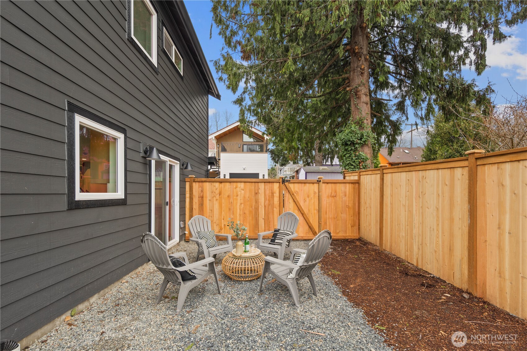 815 26th Avenue South, Unit B Seattle, WA 98144 - Photo 31 of 33 a backyard of a house with outdoor seating