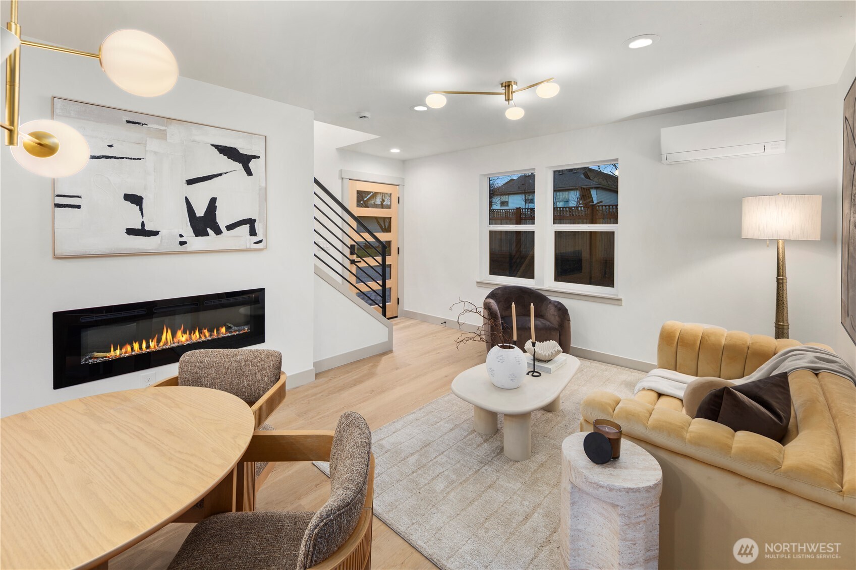 815 26th Avenue South, Unit B Seattle, WA 98144 - Photo 5 of 33 a living room with furniture and a fireplace